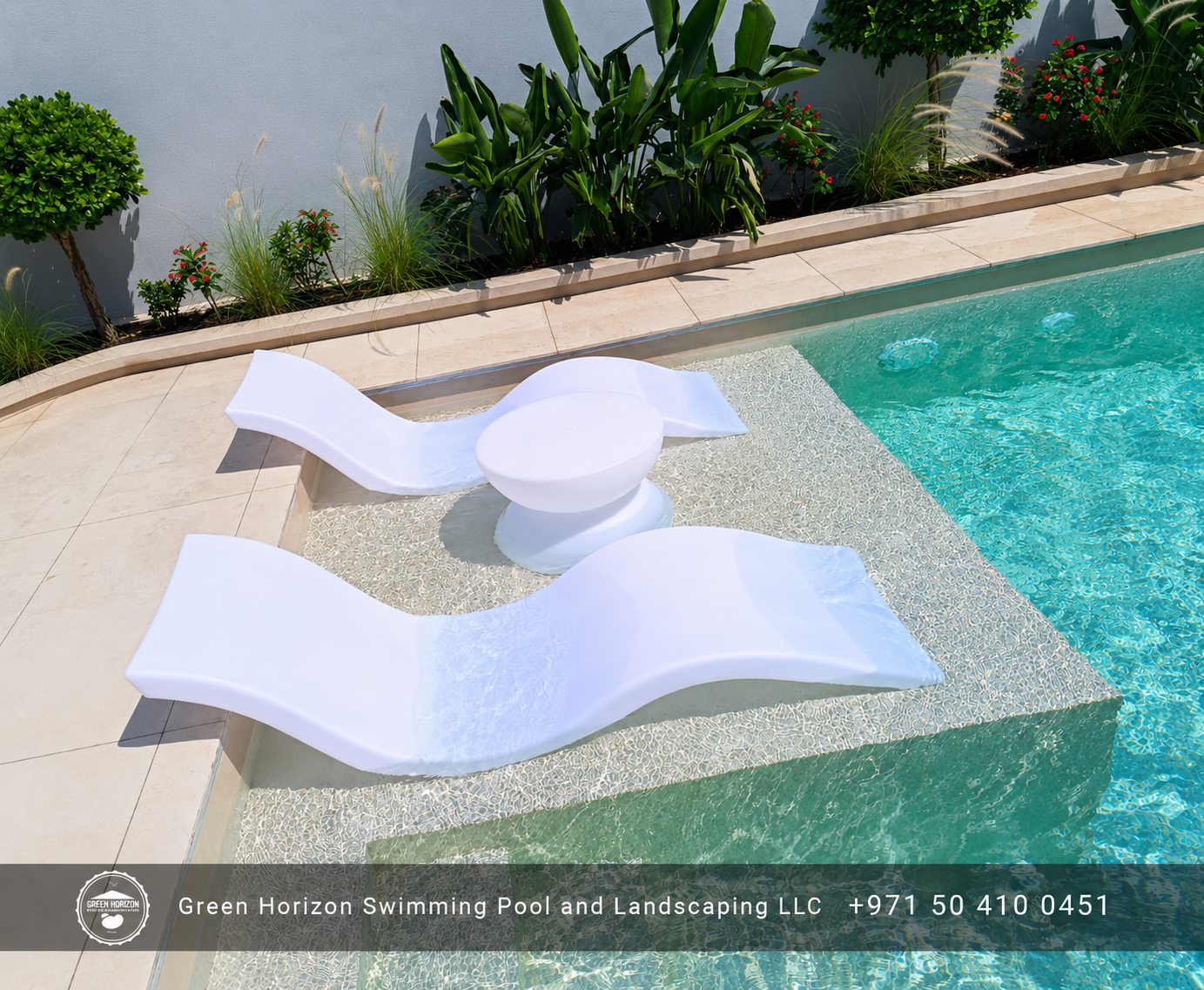 Luxury swimming pool with in-water sun loungers and landscaped surroundings in Dubai